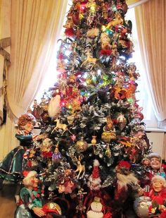 a christmas tree with many ornaments on it