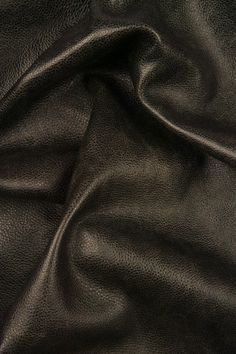 black leather textured up close to the surface