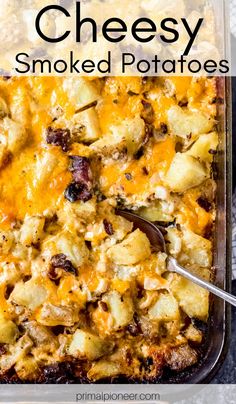 a casserole dish filled with potatoes and cheese