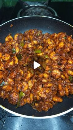 the food is being cooked in a pan on the stove top and ready to be eaten