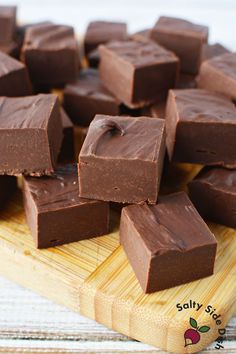 chocolate fudges on a cutting board ready to be eaten