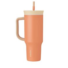 an orange cup with a straw sticking out of it's top and the lid