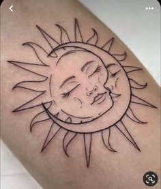 a sun and moon tattoo on the arm