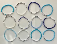 six different bracelets with beads on them