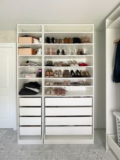 a white closet filled with lots of shoes