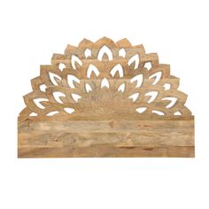 an intricate wooden carving on a white background