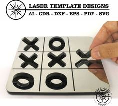 a person is playing an xo tic - tac toe game with their fingers