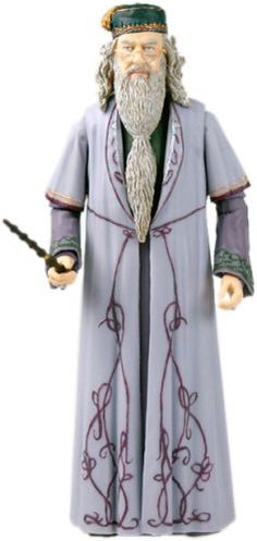 the wizard figurine is holding two wands