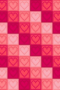 a red and white checkered pattern with hearts