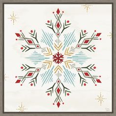 a snowflake with red, green and blue designs on it's surface