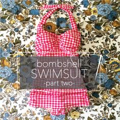 a pink and white checkered bathing suit sitting on top of a floral wallpaper