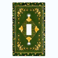 a decorative light switch plate cover in green and yellow