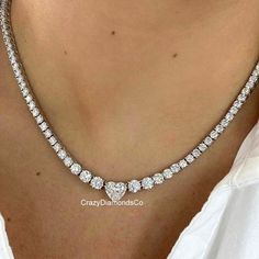 9 MM Heart Cut Moissanite Diamond Tennis Necklace, Iced Out Diamond Choker Dainty Wedding Necklace, 14k Gold Handmade Customized Necklace ✹✹𝐖𝐞𝐥𝐜𝐨𝐦𝐞 𝐭𝐨 𝐂𝐫𝐚𝐳𝐲𝐃𝐢𝐚𝐦𝐨𝐧𝐝𝐬𝐂𝐨✹✹ ★ 𝑴𝒂𝒊𝒏 𝑺𝒕𝒐𝒏𝒆 𝑫𝒆𝒕𝒂𝒊𝒍𝒔 ★ ● Stone Shape:- Heart Cut & Round Cut ● Stone Type:- Moissanite & Simulated-Diamond ● Total Weight:- 47 TCW (App.) ● Dimension:- 9 MM & 4.50 MM ● Color:- White ● Clarity: VVS ● Cut Grade: Excellent ● Making Process: Handmade - Crafted by our experienced team ★ 𝑰𝒕𝒆? Luxury Dazzling Heart Cut Necklace, Diamond Wedding Tennis Necklace, Exquisite Diamond Accents Tennis Necklace For Wedding, Dazzling Wedding Necklace With Vvs Clarity, Heart Cut Solitaire Necklace For Wedding, Anniversary White Diamond Tennis Necklace, Dazzling Vvs Clarity Necklace For Wedding, Diamond White Round Tennis Necklace For Wedding, Wedding Tennis Necklace In Diamond White