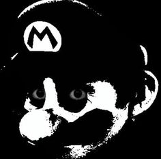 a close up of a person wearing a mario bros hat with the letter m on it