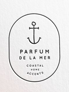 the logo for parfum de la mer, a coastal home accent's