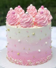 a cake with pink frosting and sprinkles on top is shown in an instagram