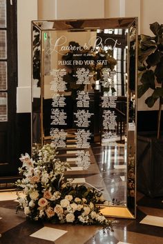 the seating chart for an event is displayed in front of a large glass display case