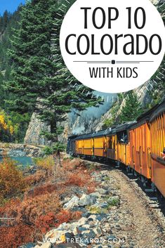 a yellow train traveling down tracks next to trees and mountains with text overlay top 10 colorado with kids