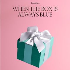 a green and white box with a bow on it that says love is when the box is always blue