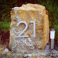 a large rock with the number twenty two on it