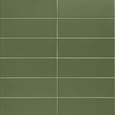 a green tile wall with white lines on it