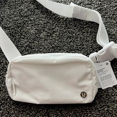 White Lululemon everywhere belt bag. New with tags, never worn Lululemon White Belt Bag, White Lulu Belt Bag, Tj Maxx Purses, Lululemon Fannypack, Orlando Outfits, Lululemon Accessories, White Belt Bag, Lululemon Backpack, Crocs Outfit