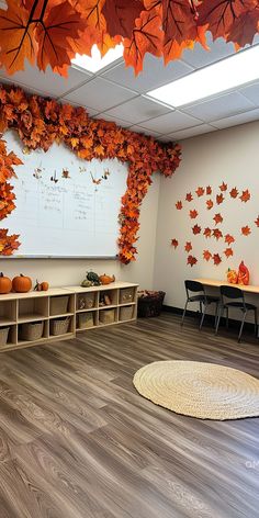 Classroom adorned with whimsical fall decor, featuring autumn leaf garlands and pumpkin displays, perfect for DIY Thanksgiving and fall activities. Fall Decor School Hallway, Fall Decor Ideas For Classroom Wall, Thanksgiving Decor Classroom, Diy Fall Classroom Decorations, Fall School Decor, Fall School Decorations, Spring Decorations Classroom, Classroom Book Nook, Classroom Fall Decor