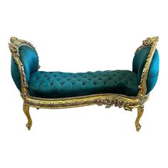 a blue and gold bench with ornate detailing