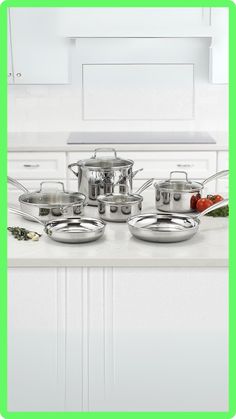 the pots and pans are sitting on the kitchen counter with green border around them