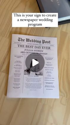 a newspaper sitting on top of a wooden table next to a cell phone and tablet