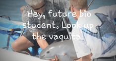 two men standing next to each other with a dolphin in front of them and the caption reads hey, future bio student, look up the vaquita