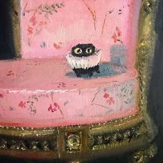 a painting of a black and white cat sitting on a pink chair with gold trim