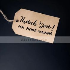 a thank you for being amazing tag hanging from a string