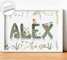 the word alex is made up of animals and leaves on a white background with green foliage