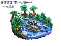 a lego model of a pond with trees and plants on it's sides, in front of a white background