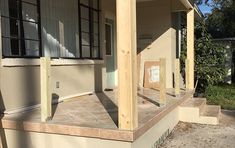 the front porch of a house being built