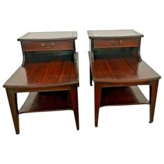 two wooden end tables with drawers on each side