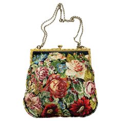 A charming and highly attractive handbag, perfect for evening or that special occasion. the needlepoint is of the highest and finest quality with roses and a variety of other flowers, and foliage on both the front and back and gusset. The frame is of plain bit worked gilt metal , with an ivory grosgrain lining, all original. The chain can be worn as double/short or long and on the shoulder/full length. Whether worn with black as a stand out item, or as part of an overall ensemble, this is a beau Needlepoint Purse, Pierre Cardin, A Rose, Fashion Handbags, Needlepoint, Evening Bags, Bead Work, Metallica, Special Occasion