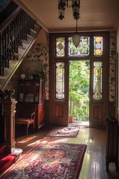 the sun shines through stained glass windows in an old - fashioned room with wooden floors