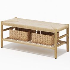 a wooden bench with two baskets on it's sides and an end table underneath