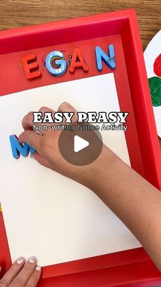 a person is writing on a paper with the words easy peasy in front of them