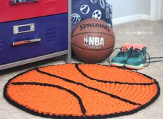 an orange basketball rug next to a blue locker with shoes on it and a pair of sneakers