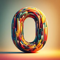 the letter o is made up of colored pencils