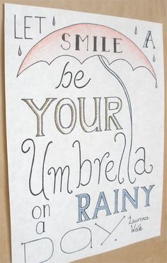 a poster with the words smile, be your umbrella on a rainy day