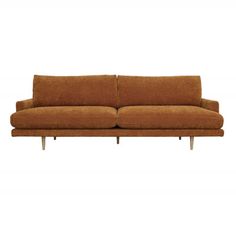 a brown couch sitting on top of a white floor