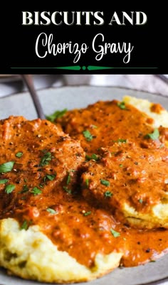 biscuits and gravy on a plate with parsley