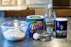 ingredients to make an ice cream dessert sitting on a table