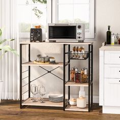 a microwave is on top of a shelf in a kitchen