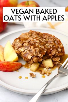 an oatmeal breakfast with apples and granola on a plate next to a fork