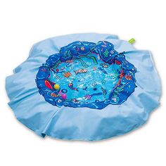 an inflatable swimming pool with fish and bubbles on the bottom, is shown